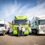 Paul and Sarah Martin standing in front of PFS Training vehicles